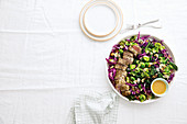 Red cabbage salad with fennel-crusted pork