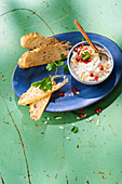 Oriental curd dip with pomegranate