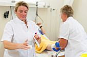 Nurses dressing a wound