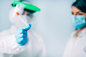 Medical worker taking swab for a coronavirus test