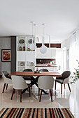 Mahogany dining table and designer shell chairs
