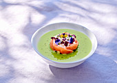 Pea soup with grapefruit and edible flowers