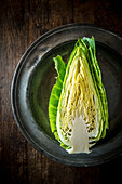 Half Cabbage on a metal plate