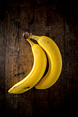 Bananas on wooden surface
