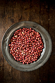 Peanuts on a metal plate