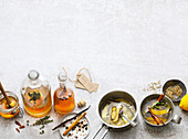 Spiced vinegar (honey, juniper) and spiced oils (ginger and garlic, lemon and fennel)