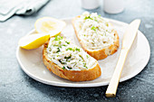 Crab meat and dill toast with lemon
