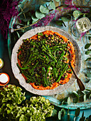 Long-stemmed broccoli, grain tabbouleh and romesco sauce