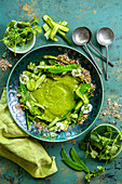 Green pea and mint soup with crispy vegetables