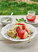 Strawberry dumplings with strawberry sauce and cottage cheese
