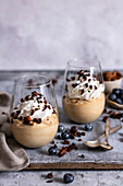 Coffee mousse with cream and roasted almonds