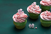 Woodruff cupcakes with strawberry and vanilla cream (vegan)