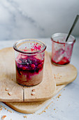 Cheesecake in a jar with berry ragout