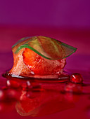 Lime pomegranate jelly ravioli with strawberry mousse