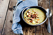 Hearty pea soup with sausages and bacon