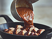 Grilled sausages with curry sauce