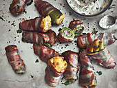 Stuffed jalapenos wrapped in bacon