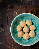 White chocolate truffles in a blue bowl