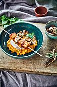 Mashed sweet potatoes with sticky tofu, mushrooms and cashew and coconut cream