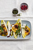 Chicory and orange salad with pomegranate seed and ulva flakes