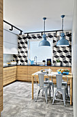 Tiles with graphic pattern in modern kitchen in industrial style