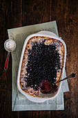 Curd, rice and bilberry pudding