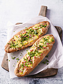 Swabian baguettes filled with sour cream, Alpine cheese and bacon