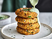 Millet fritters with a herb sauce