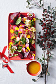 Colorful beetroot salad with feta and ruby ??grapefruit dressing for Christmas