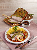 Roast veal under the herb crust with cider apples