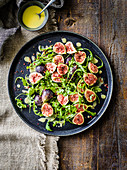 Figs with Grana Padano and pink peppercorn dressing
