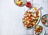 Tomato, goat's red and basil salad with raspberry vinegar dressing