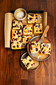 Gluten-free yoghurt and coconut slices with morello cherries