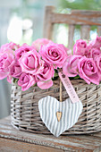 Gift basket with roses, heart pendant, and a 'Good Luck' tag