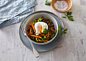 Black lentil with curcuma and poched egg