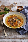 Beef broth with liver dumplings