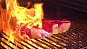 Beef steak on hot grill