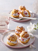 Profiteroles with cream cheese and strawberries