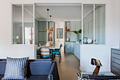 View from living room into dining area in kitchen