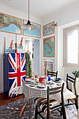 Retro fridge with Union-Flag front and framed maps in dining room