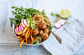 Noodle falafel bowl with vegetables
