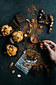 Hand taking cocoa with a spoon for make some pastries