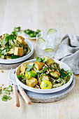 Vegan zucchini and tofu noodles with coriander pesto