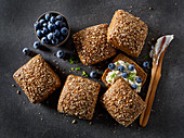 Multigrain rolls with cream cheese and blueberries