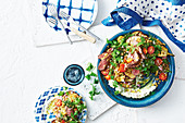 Cumin-spiced lamb with eggplant and freekeh salad