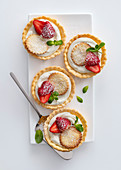Lemon cream tartlets with strawberries