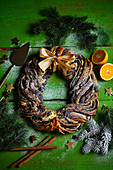 Christmas wreath of yeast dough with poppy seeds
