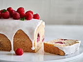 Vegan sponge cake with raspberries and icing