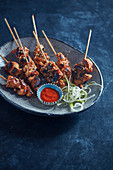 Chicken skewers with sesam and soy