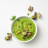 Cream of pea and clam soup